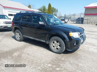 2011 Ford Escape Limited with VIN 1FMCU9EG5BKC33192, listed as a IAAI auction lot 42032152 with 160,745 mi miles. Bid and sale history available at carsss.com. Image 1.