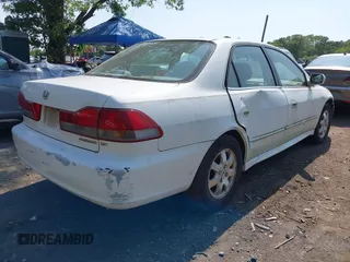 2001 Honda Accord EX z VIN 1HGCG56611A124406, wystawiony jako IAAI lot #42401266 z przebiegiem 177 917 mil mil oraz . Historia ofert i sprzedaży dostępna na DreamBid. Obrazek 4.