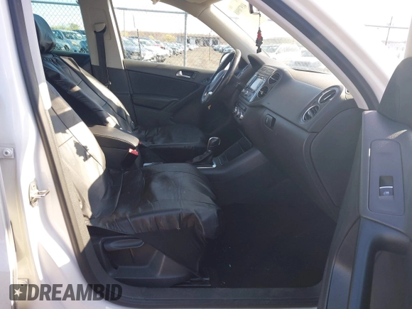 2013 Volkswagen Tiguan SE with VIN WVGBV7AX7DW511699, listed as a IAAI auction lot 41970908 with 164,758 mi miles and . Bid and sale history available at DreamBid. Image 5.