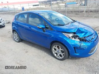 2011 Ford Fiesta SES with VIN 3FADP4FJ8BM119571, listed as a IAAI auction lot 41997018 with 108,487 mi miles. Bid and sale history available at carsss.com. Image 1.