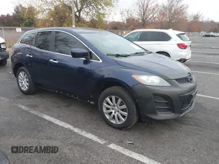2011 Mazda CX-7 i Touring with VIN JM3ER2CM5B0358761, listed as a IAAI auction lot 40750338 with 999,999 mi miles. Bid and sale history available at carsss.com. Image 1.