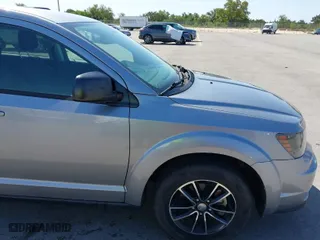 2017 Dodge Journey SE with VIN 3C4PDCAB1HT573511, listed as a IAAI auction lot 41984865 with 128,721 mi miles. Bid and sale history available at carsss.com. Image 18.