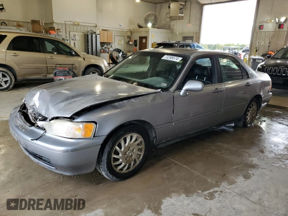 1998 Acura RL Premium with VIN JH4KA965XWC012742, listed as a Copart auction lot 73298574 with 0 mi miles and Salvage Title. Bid and sale history available at carsss.com. Image 1.