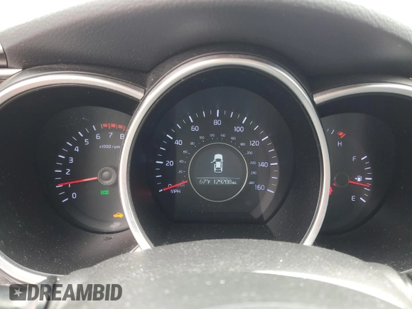 2015 Kia Optima LX with VIN KNAGM4A70F5631684, listed as a Copart auction lot 55786925 with 129,208 mi miles and Salvage Title. Bid and sale history available at DreamBid. Image 9.