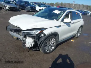 2020 Infiniti QX50 Essential with VIN 3PCAJ5M12LF110250, listed as a IAAI auction lot 41445252 with 48,963 mi miles and . Bid and sale history available at DreamBid. Image 2.