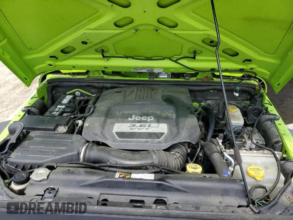 2013 Jeep Wrangler Unlimited Sport z VIN 1C4BJWDG6DL505416, wystawiony jako Copart lot #59910525 z przebiegiem 115 908 mil mil oraz Czysty tytuł • Clean title. Historia ofert i sprzedaży dostępna na DreamBid. Obrazek 11.