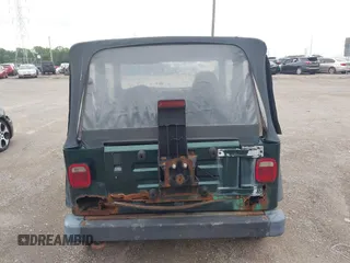 1999 Jeep Wrangler SE z VIN 1J4FY29P7XP479351, wystawiony jako IAAI lot #42797020 z przebiegiem 171 598 mil mil oraz . Historia ofert i sprzedaży dostępna na DreamBid. Obrazek 13.