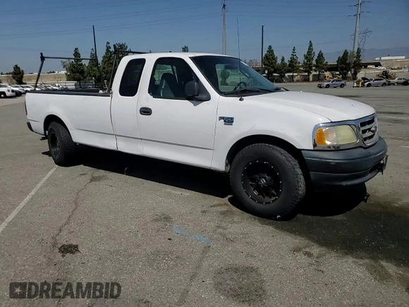 2003 Ford F-150 XL with VIN 1FTRX17W53NA54971, listed as a Copart auction lot 63686385 with 133,800 mi miles and Salvage title. Bid and sale history available at DreamBid. Image 13.