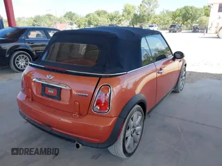 2005 MINI Convertible with VIN WMWRF334X5TF61026, listed as a IAAI auction lot 42125720 with 117,908 mi miles and . Bid and sale history available at DreamBid. Image 4.