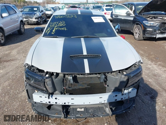 2022 Dodge Charger Scat Pack Widebody with VIN 2C3CDXGJ6NH176650, listed as a IAAI auction lot 41863122 with 34,569 mi miles and . Bid and sale history available at DreamBid. Image 12.