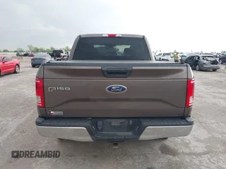 2015 Ford F-150 XLT with VIN 1FTEW1EP1FKE71345, listed as a IAAI auction lot 41946214 with 314,016 mi miles and . Bid and sale history available at DreamBid. Image 16.