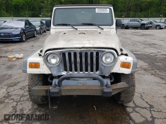 2005 Jeep Wrangler Sport z VIN 1J4FA49S55P334844, wystawiony jako Copart lot #52026835 z przebiegiem 209 216 mil mil oraz Czysty tytuł • Clean title. Historia ofert i sprzedaży dostępna na DreamBid. Obrazek 5.