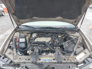 2003 Chevrolet Impala with VIN 2G1WF52E739445725, listed as a IAAI auction lot 41714913 with 116,119 mi miles. Bid and sale history available at carsss.com. Image 10.