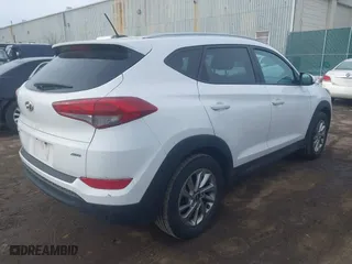 2016 Hyundai Tucson SE with VIN KM8J3CA49GU149522, listed as a IAAI auction lot 41649515 with 103,136 mi miles. Bid and sale history available at carsss.com. Image 4.