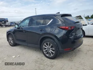 2020 Mazda CX-5 Grand Touring with VIN JM3KFBDM4L0738976, listed as a Copart auction lot 56683955 with 191,650 mi miles and Clean Title. Bid and sale history available at DreamBid. Image 2.