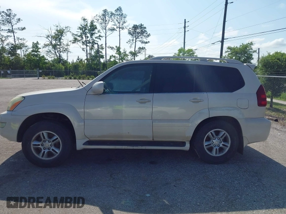 2003 Lexus GX 470 with VIN JTJBT20X630019033, listed as a IAAI auction lot 42128698 with 286,811 mi miles and . Bid and sale history available at DreamBid. Image 14.