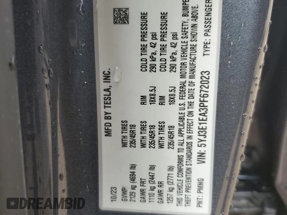 2023 Tesla Model 3 with VIN 5YJ3E1EA3PF672023, listed as a Copart auction lot 57571645 with 18,115 mi miles and Salvage title. Bid and sale history available at DreamBid. Image 12.