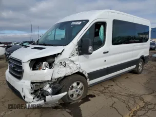 2020 Ford Transit Passenger XL with VIN 1FBAX2CG0LKA66498, listed as a Copart auction lot 82969724 with 94,500 mi miles and Salvage Title. Bid and sale history available at DreamBid. Image 1.
