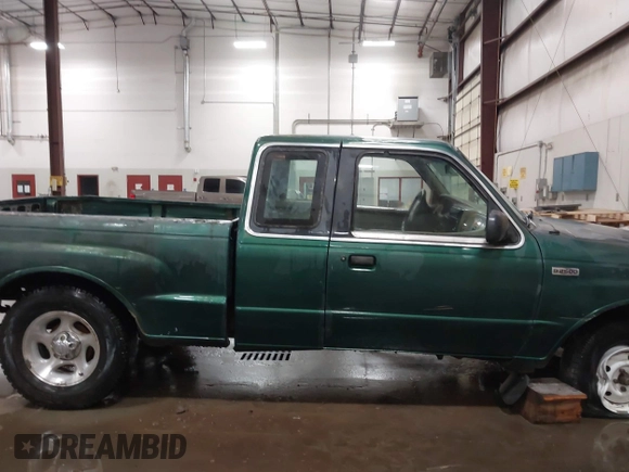 1999 Mazda B-Series Truck SE z VIN 4F4YR16C0XTM43278, wystawiony jako IAAI lot #41687429 z przebiegiem 288 858 mil mil oraz . Historia ofert i sprzedaży dostępna na DreamBid. Obrazek 13.