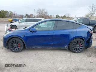 2020 Tesla Model Y Long Range with VIN 5YJYGDEF0LF000380, listed as a IAAI auction lot 41867489 with 66,294 mi miles and . Bid and sale history available at DreamBid. Image 14.