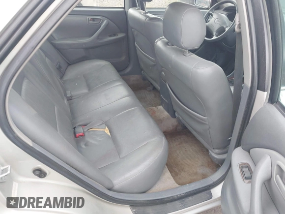 2001 Toyota Camry LE z VIN 4T1BF28K71U127407, wystawiony jako IAAI lot #42247606 z przebiegiem 289 995 mil mil oraz . Historia ofert i sprzedaży dostępna na DreamBid. Obrazek 8.