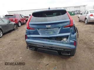 2024 Cadillac XT4 AWD Premium Luxury with VIN 1GYFZDR45RF143981, listed as a IAAI auction lot 42032787 with 14,700 mi miles and . Bid and sale history available at DreamBid. Image 16.