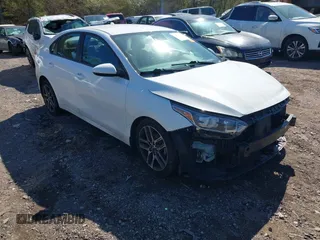 2019 Kia Forte S z VIN 3KPF34ADXKE120523, wystawiony jako IAAI lot #41742348 z przebiegiem 122 431 mil mil oraz . Historia ofert i sprzedaży dostępna na DreamBid. Obrazek 1.