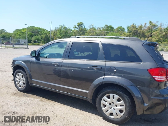 2017 Dodge Journey SE with VIN 3C4PDCAB2HT579852, listed as a IAAI auction lot 42008261 with 112,234 mi miles and . Bid and sale history available at DreamBid. Image 14.