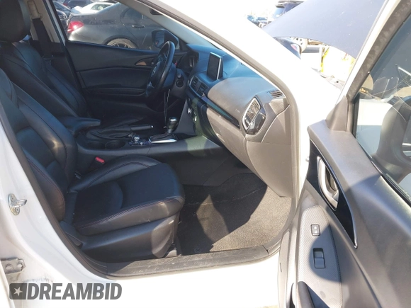 2014 Mazda 3 i Grand Touring with VIN JM1BM1M7XE1102093, listed as a IAAI auction lot 41344433 with 148,395 mi miles and . Bid and sale history available at DreamBid. Image 5.