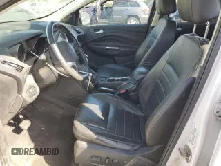2014 Ford Escape Titanium z VIN 1FMCU0J9XEUD01904, wystawiony jako Copart lot #61819555 z przebiegiem 217 794 mil mil oraz Czysty tytuł • Clean title. Historia ofert i sprzedaży dostępna na DreamBid. Obrazek 7.