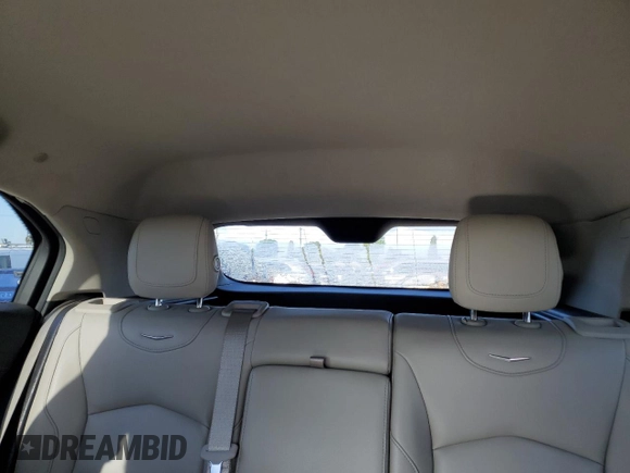 2019 Cadillac XT4 FWD Luxury z VIN 1GYAZAR42KF116087, wystawiony jako Copart lot #50231165 z przebiegiem 69 091 mil mil oraz Szkoda całkowita • Salvage title. Historia ofert i sprzedaży dostępna na DreamBid. Obrazek 10.