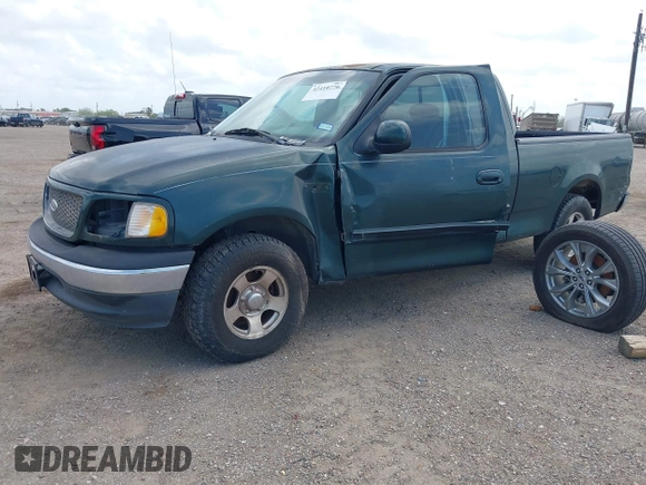 2001 Ford F-150 XL with VIN 1FTZX17221NB70154, listed as a IAAI auction lot 42410776 with 173,864 mi miles and . Bid and sale history available at DreamBid. Image 2.