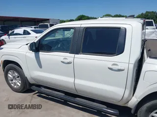 2022 Nissan Frontier SV z VIN 1N6ED1EJ8NN650378, wystawiony jako IAAI lot #39310357 z przebiegiem 45 898 mil mil oraz . Historia ofert i sprzedaży dostępna na DreamBid. Obrazek 15.