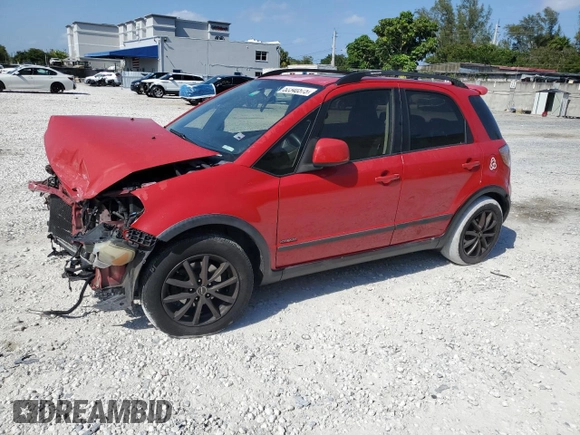 2010 Suzuki SX4 z VIN JS2YA5A32A6300486, wystawiony jako Copart lot #52340575 z przebiegiem 200 190 mil mil oraz Szkody całkowita. Historia ofert i sprzedaży dostępna na DreamBid. Obrazek 1.