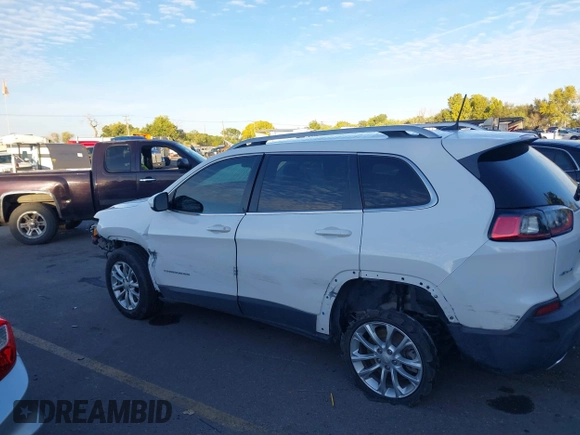 2019 Jeep Cherokee Latitude with VIN 1C4PJMCX0KD104155, listed as a IAAI auction lot 40647860 with 125,802 mi miles. Bid and sale history available at carsss.com. Image 14.