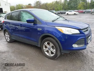 2015 Ford Escape SE z VIN 1FMCU9GX0FUB23447, wystawiony jako IAAI lot #42219379 z przebiegiem 113 274 mil mil oraz . Historia ofert i sprzedaży dostępna na DreamBid. Obrazek 1.