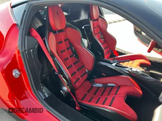 2021 Ferrari SF90 z VIN ZFF95NLA4M0265120, wystawiony jako Copart lot #58449645 z przebiegiem 5000 mil mil oraz Szkody całkowita. Historia ofert i sprzedaży dostępna na DreamBid. Obrazek 6.