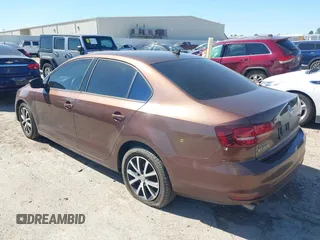 2016 Volkswagen Jetta Sedan 1.4T SE with VIN 3VWD67AJ2GM340416, listed as a IAAI auction lot 41663211 with 157,283 mi miles. Bid and sale history available at carsss.com. Image 3.