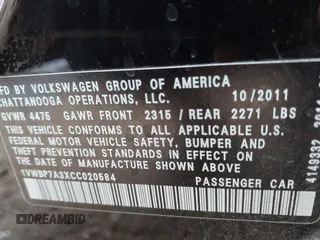 2012 Volkswagen Passat SE w/Sunroof with VIN 1VWBP7A3XCC020584, listed as a IAAI auction lot 41905793 with 138,642 mi miles. Bid and sale history available at carsss.com. Image 9.