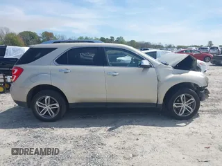 2016 Chevrolet Equinox LTZ z VIN 1GNALDEK1GZ105026, wystawiony jako IAAI lot #41900813 z przebiegiem 115 943 mil mil oraz . Historia ofert i sprzedaży dostępna na DreamBid. Obrazek 14.