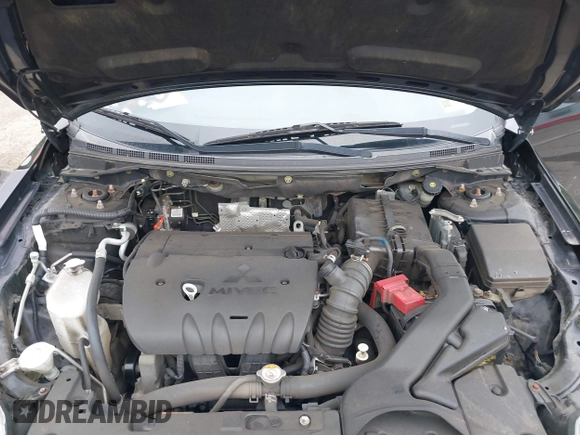 2015 Mitsubishi Lancer ES z VIN JA32U2FU9FU002350, wystawiony jako IAAI lot #40054160 z przebiegiem 120 980 mil mil oraz . Historia ofert i sprzedaży dostępna na DreamBid. Obrazek 10.