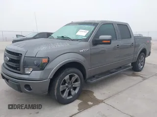 2013 Ford F-150 XL with VIN 1FTFW1CF2DFB82141, listed as a IAAI auction lot 41552919 with 226,921 mi miles. Bid and sale history available at carsss.com. Image 2.