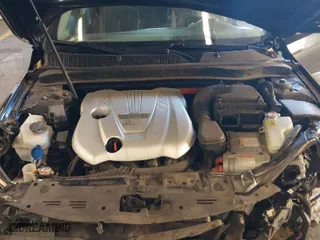 2015 Kia Optima Hybrid with VIN KNAGM4AD1F5083989, listed as a IAAI auction lot 41013875 with NaN miles. Bid and sale history available at carsss.com. Image 10.