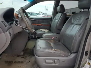 2012 Toyota Sienna XLE AAS with VIN 5TDYK3DC6CS275537, listed as a Copart auction lot 66040605 with 135,148 mi miles and Clean title. Bid and sale history available at DreamBid. Image 7.