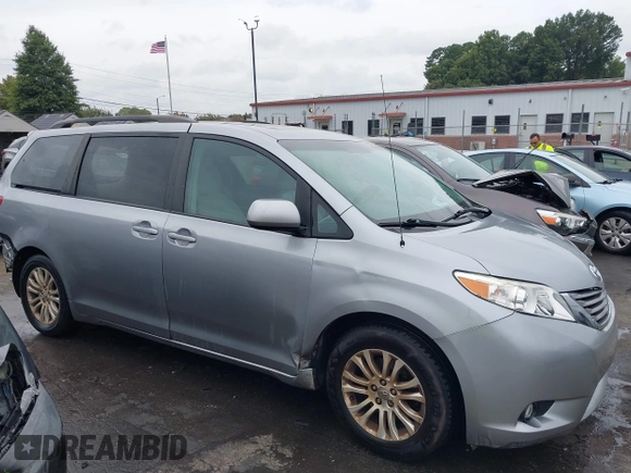 2012 Toyota Sienna XLE AAS with VIN 5TDYK3DC6CS243008, listed as a IAAI auction lot 40351580 with 157,752 mi miles and . Bid and sale history available at DreamBid. Image 13.