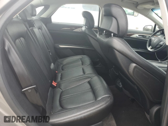 2015 Lincoln MKZ Hybrid z VIN 3LN6L2LU4FR625940, wystawiony jako Copart lot #61721025 z przebiegiem 56 151 mil mil oraz Szkoda całkowita • Salvage title. Historia ofert i sprzedaży dostępna na DreamBid. Obrazek 10.