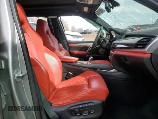 2015 BMW X5 M z VIN 5YMKT6C55F0C89017, wystawiony jako Copart lot #49052065 z przebiegiem 125 287 mil mil oraz Tytuł czysty. Historia ofert i sprzedaży dostępna na DreamBid. Obrazek 7.