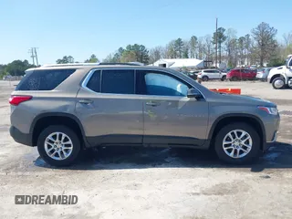 2018 Chevrolet Traverse LT Cloth z VIN 1GNEVGKW4JJ281837, wystawiony jako IAAI lot #41919081 z przebiegiem 91 496 mil mil oraz . Historia ofert i sprzedaży dostępna na DreamBid. Obrazek 13.