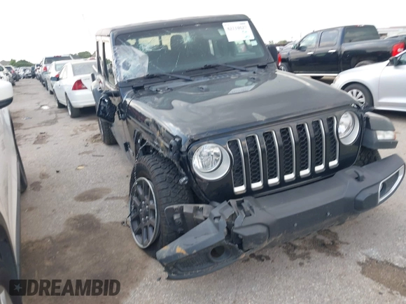 2023 Jeep Gladiator Overland z VIN 1C6HJTFG2PL523686, wystawiony jako IAAI lot #42134627 z przebiegiem 33 575 mil mil oraz . Historia ofert i sprzedaży dostępna na DreamBid. Obrazek 6.