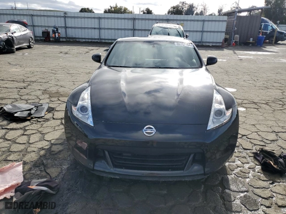2010 Nissan 370Z with VIN JN1AZ4EHXAM506643, listed as a Copart auction lot 86757104 with 70,618 mi miles and Salvage Title. Bid and sale history available at carsss.com. Image 5.